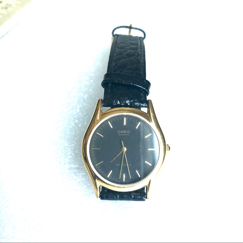 Casio women watch black leather strap gold rim